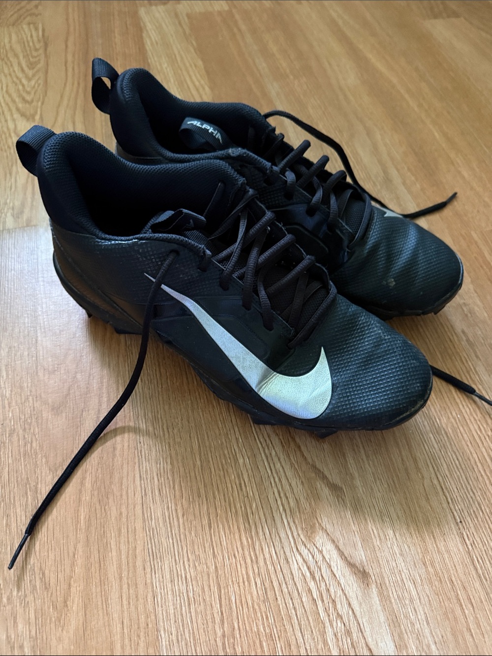 Nike Black Men's Athletic Cleats with White Swoosh